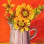 Ceramic pitcher with sunflowers.